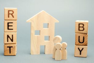 Rent and buy blocks sit beside a small house for a 2026 rent vs mortgage guide